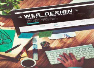 Professional web designer working on a responsive website layout for a local business in Visakhapatnam.
